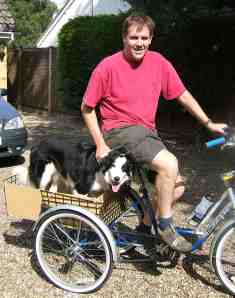 Kevin and dog Murphy on an adapted tricycle