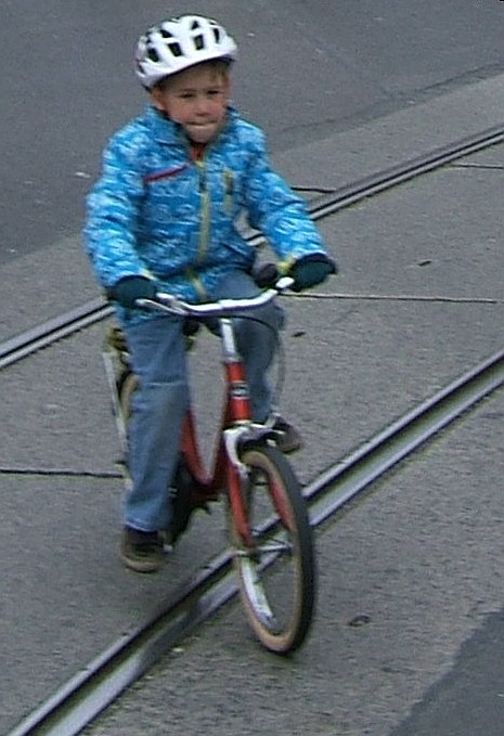 Determined child cyclist at RADpaRADe