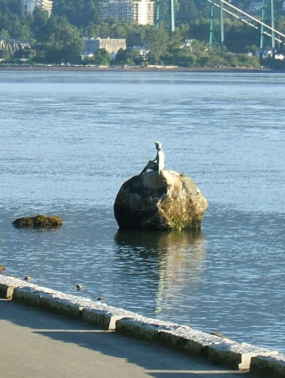 Girl in a wet suit statue