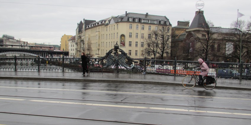 Solitary woman cyclist Berlin