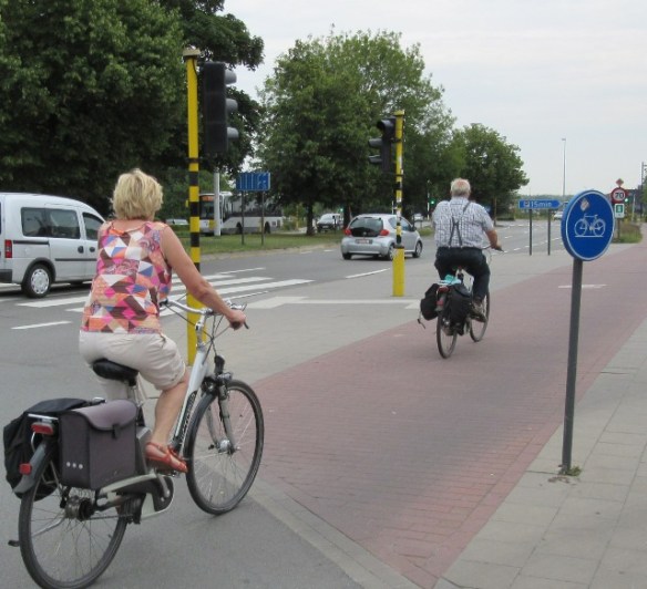 Cycling in Bruges by Kevin Mayne