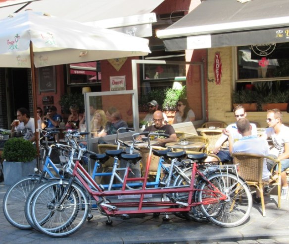 Cycling in Bruges by Kevin Mayne